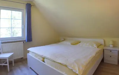 Ein Bett oder Betten in einem Zimmer der Unterkunft Ankerplatz RH 4