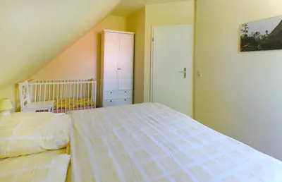 Ein Bett oder Betten in einem Zimmer der Unterkunft Ankerplatz RH 4