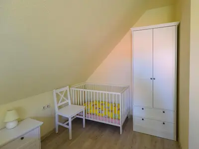 Ein Bett oder Betten in einem Zimmer der Unterkunft Ankerplatz RH 4