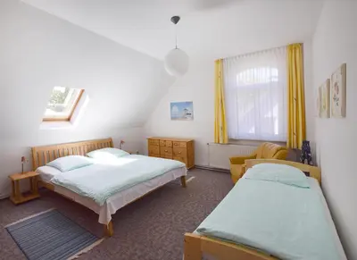 Ein Bett oder Betten in einem Zimmer der Unterkunft Haus Anna Wo 4