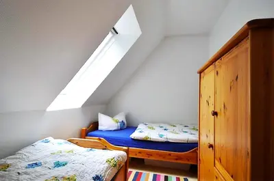 Ein Bett oder Betten in einem Zimmer der Unterkunft Eichenpark Haus 1 Wohnung 6