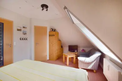 Ein Bett oder Betten in einem Zimmer der Unterkunft Buchenpark Wo 7