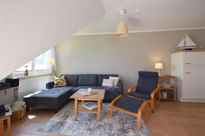 Ein Sitzbereich in der Unterkunft Haus Albatros Albatros Wo 3