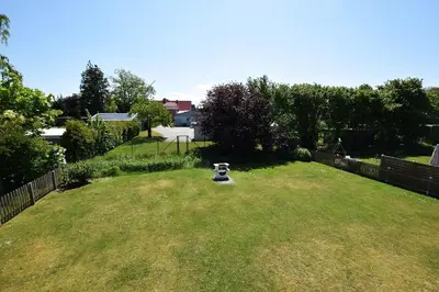 Ein Garten an der Unterkunft Haus Albatros Albatros Wo 3