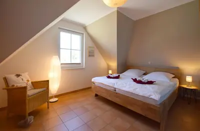 Ein Bett oder Betten in einem Zimmer der Unterkunft Haus Albatros Albatros Wo 3