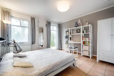 Ein Bett oder Betten in einem Zimmer der Unterkunft Trident Wohnung 1