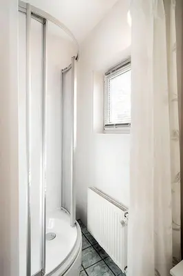 Ein Badezimmer in der Unterkunft Trident Wohnung 1