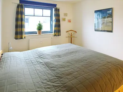 Ein Bett oder Betten in einem Zimmer der Unterkunft Grüne Str 36 H W 8