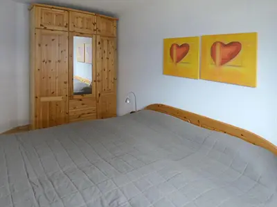 Ein Bett oder Betten in einem Zimmer der Unterkunft Grüne Str 36 H W 8