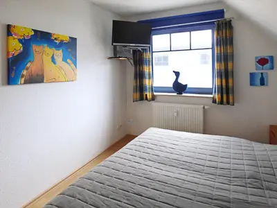 Ein Bett oder Betten in einem Zimmer der Unterkunft Grüne Str 36 H W 8