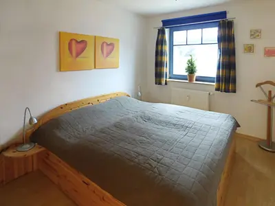 Ein Bett oder Betten in einem Zimmer der Unterkunft Grüne Str 36 H W 8