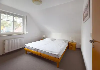 Ein Bett oder Betten in einem Zimmer der Unterkunft FHH 