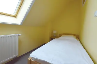Ein Bett oder Betten in einem Zimmer der Unterkunft FHH 