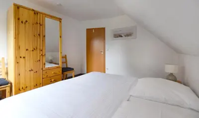 Ein Bett oder Betten in einem Zimmer der Unterkunft FHH 