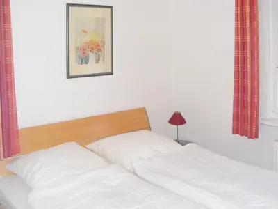Ein Bett oder Betten in einem Zimmer der Unterkunft Buchengrund Wo 5