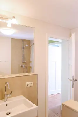 Ein Badezimmer in der Unterkunft Kapitänshaus Mühlenpark Haus 6 Wo 25
