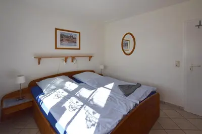 Ein Bett oder Betten in einem Zimmer der Unterkunft Eichenpark Haus 4 Wohnung 2