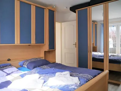 Ein Bett oder Betten in einem Zimmer der Unterkunft Mühlenpark 2 Mühlenpark Haus A Wo 2