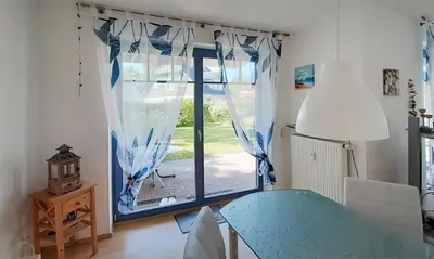 Ein Bett oder Betten in einem Zimmer der Unterkunft Moewennest