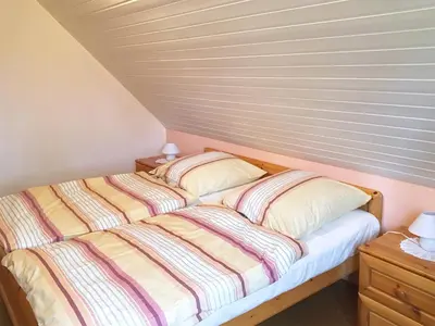 Ein Bett oder Betten in einem Zimmer der Unterkunft Hirtenstr 1 F