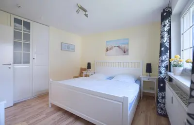 Ein Bett oder Betten in einem Zimmer der Unterkunft Mühlenpark 1 Mühlenpark Haus 4 Wo 14