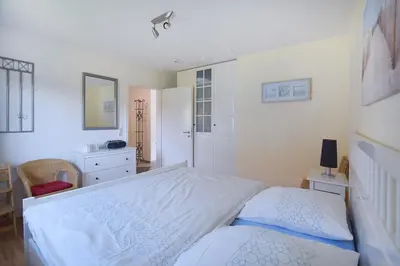 Ein Bett oder Betten in einem Zimmer der Unterkunft Mühlenpark 1 Mühlenpark Haus 4 Wo 14