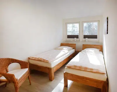 Ein Bett oder Betten in einem Zimmer der Unterkunft Am Darßwald Haus 2 1