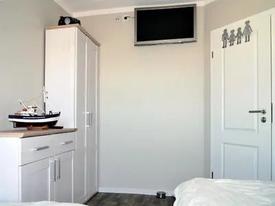 Ein Bett oder Betten in einem Zimmer der Unterkunft Im Grünnen Wo 2