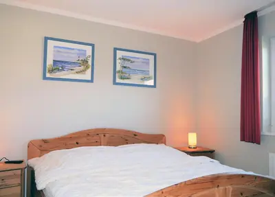 Ein Bett oder Betten in einem Zimmer der Unterkunft Im Grünnen Wo 2
