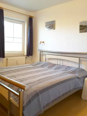Ein Bett oder Betten in einem Zimmer der Unterkunft An der Stems Wo 1