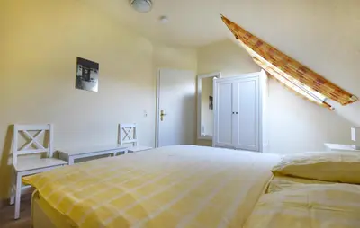 Ein Bett oder Betten in einem Zimmer der Unterkunft Ankerplatz RH 2