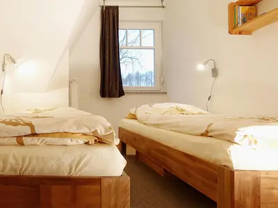 Ein Bett oder Betten in einem Zimmer der Unterkunft Grüne Straße 38 A, Wo 4