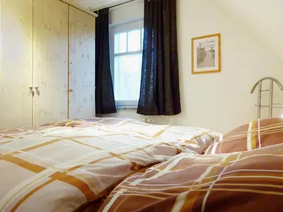 Ein Bett oder Betten in einem Zimmer der Unterkunft Grüne Straße 38 A, Wo 4