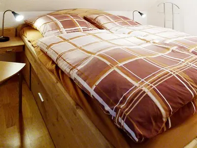 Ein Bett oder Betten in einem Zimmer der Unterkunft Grüne Straße 38 A, Wo 4