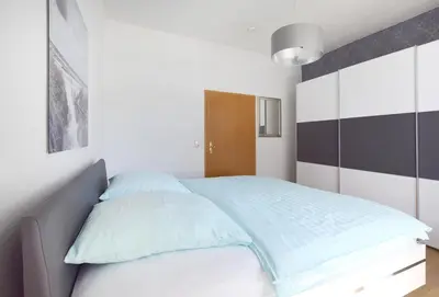 Ein Bett oder Betten in einem Zimmer der Unterkunft Haus Anna Wo 2