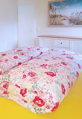 Ein Bett oder Betten in einem Zimmer der Unterkunft Haus am Darßer Wald W3