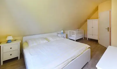 Ein Bett oder Betten in einem Zimmer der Unterkunft Ankerplatz RH 1
