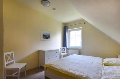 Ein Bett oder Betten in einem Zimmer der Unterkunft Ankerplatz RH 1