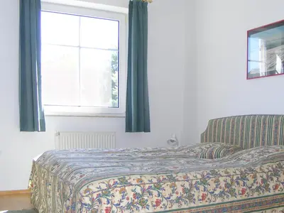 Ein Bett oder Betten in einem Zimmer der Unterkunft Frieseneck Wohnung 19