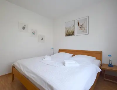 Ein Bett oder Betten in einem Zimmer der Unterkunft Buchengrund Wo 2