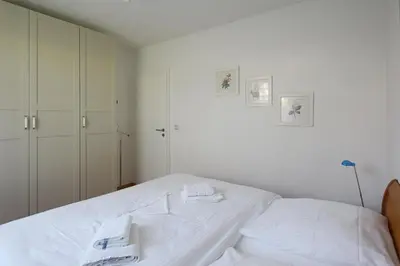 Ein Bett oder Betten in einem Zimmer der Unterkunft Buchengrund Wo 2