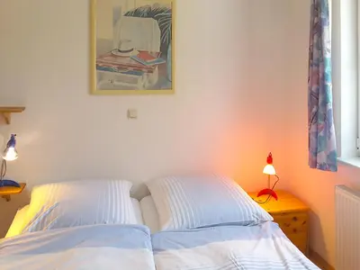 Ein Bett oder Betten in einem Zimmer der Unterkunft Haus Albatros Albatros Wo 1