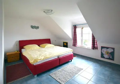 Ein Bett oder Betten in einem Zimmer der Unterkunft Erlengrund 10