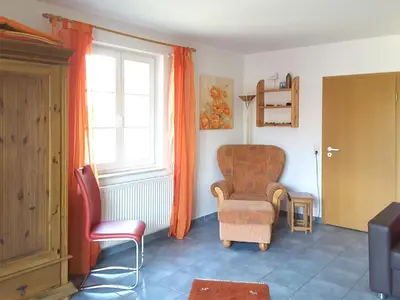 Ein Sitzbereich in der Unterkunft Erlengrund 10