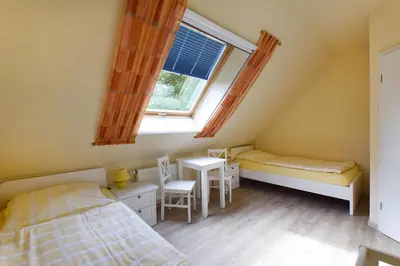 Ein Bett oder Betten in einem Zimmer der Unterkunft Ankerplatz RH 6