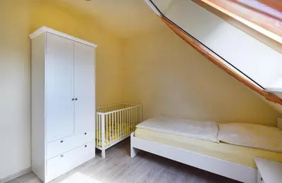 Ein Bett oder Betten in einem Zimmer der Unterkunft Ankerplatz RH 6