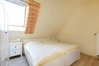 Ein Bett oder Betten in einem Zimmer der Unterkunft Ankerplatz RH 6