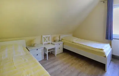 Ein Bett oder Betten in einem Zimmer der Unterkunft Ankerplatz RH 5