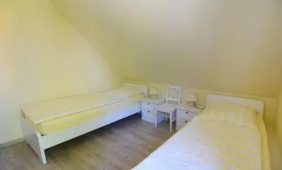 Ein Bett oder Betten in einem Zimmer der Unterkunft Ankerplatz RH 5