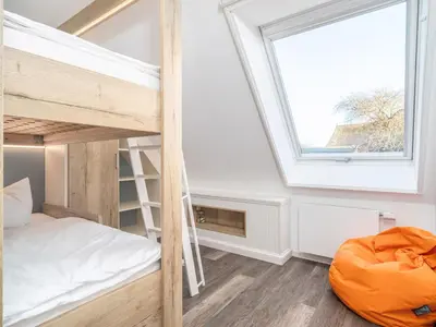 Ein Bett oder Betten in einem Zimmer der Unterkunft Tom's Hof Ferienwohnung Dascha